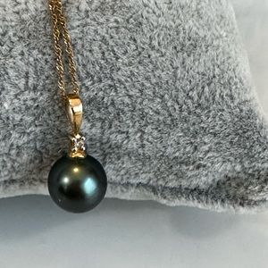Black pearl and diamond necklace